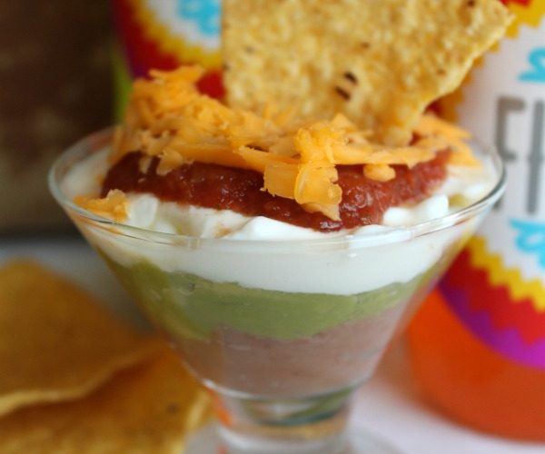 7 layer dip appetizer with wholly guacamole