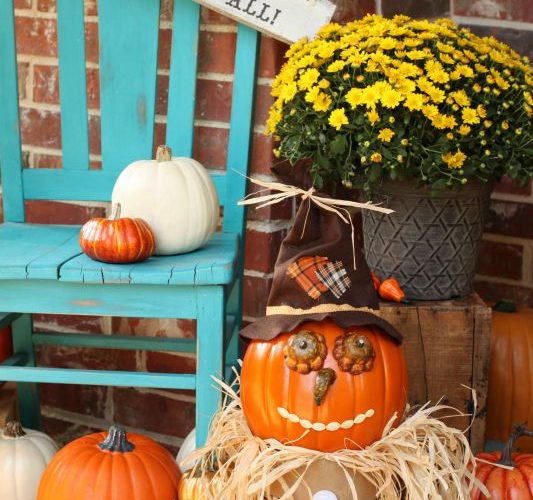 Happy fall pumpkin scarecrow