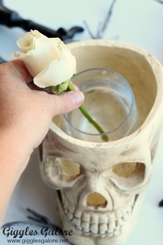 Arranging Flowers in Paper Pulp Skull