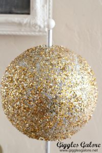 Gold glitter nye ball drop