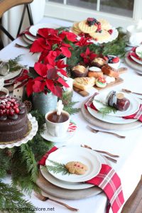 Poinsettas plaid holiday brunch table setting